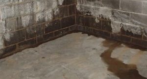water leaking in basement floor