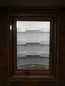 view from inside basement egress window